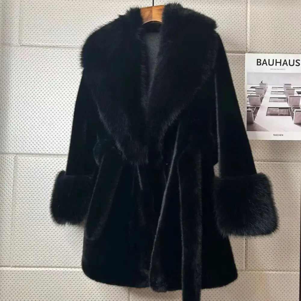 Black faux fur coat with tie.