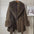 Brown fur coat with collar and cuffs.