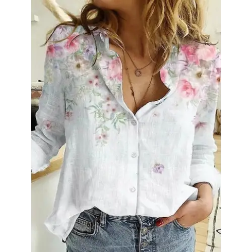 Floral-patterned button-down shirt.