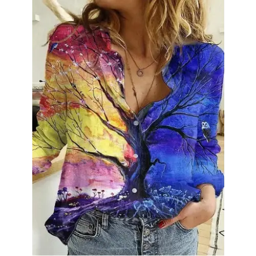Colorful tree-themed button-down shirt.