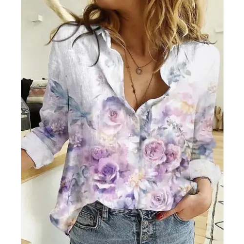 Floral-patterned button-down shirt.