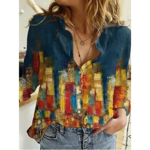 Colorful, button-down shirt with a cityscape design.