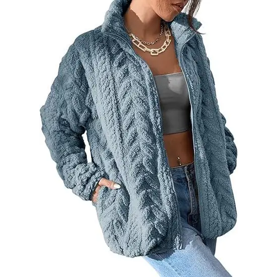 Blue fuzzy cable-knit zip-up jacket.