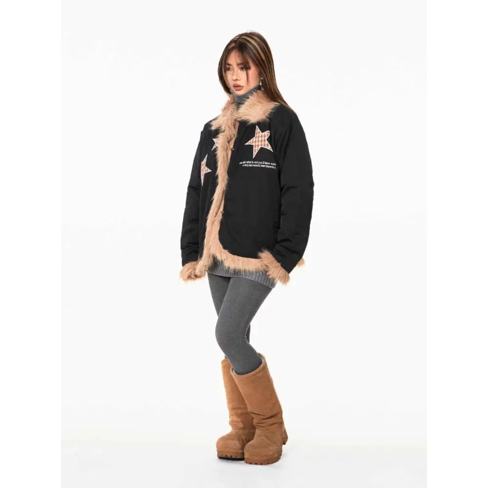 Black jacket with fur trim and star patches.
