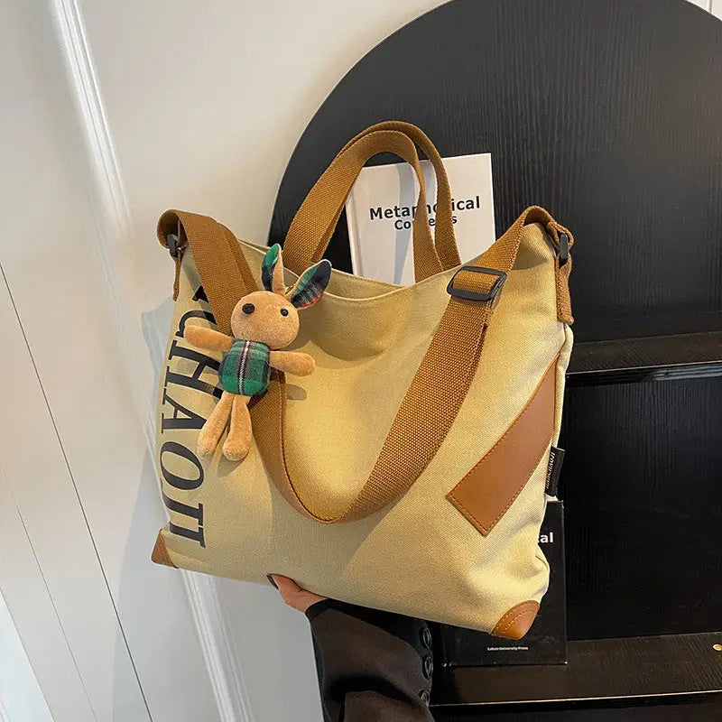 Canvas Shoulder Bag with Pendant and Ribbon Options