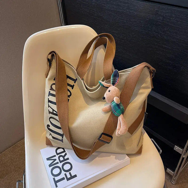 Canvas Shoulder Bag with Pendant and Ribbon Options - Beige with Pendant