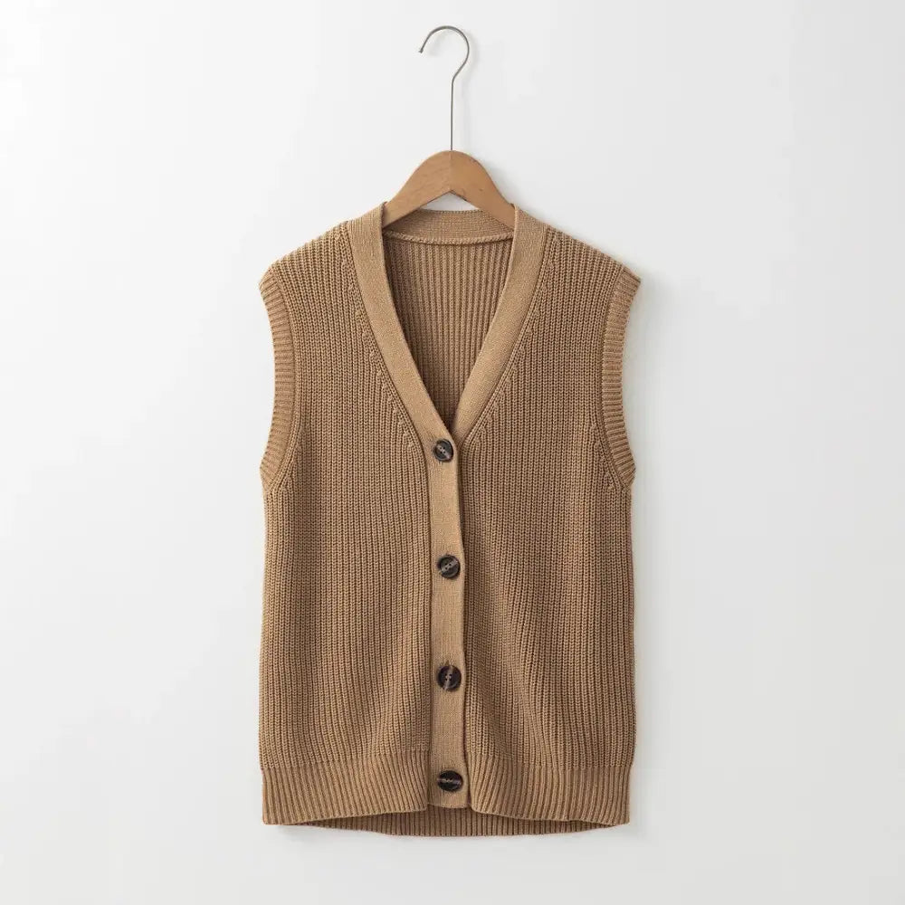 Tan knitted button-down vest.