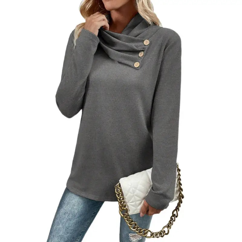 Gray cowl neck sweater with buttons.