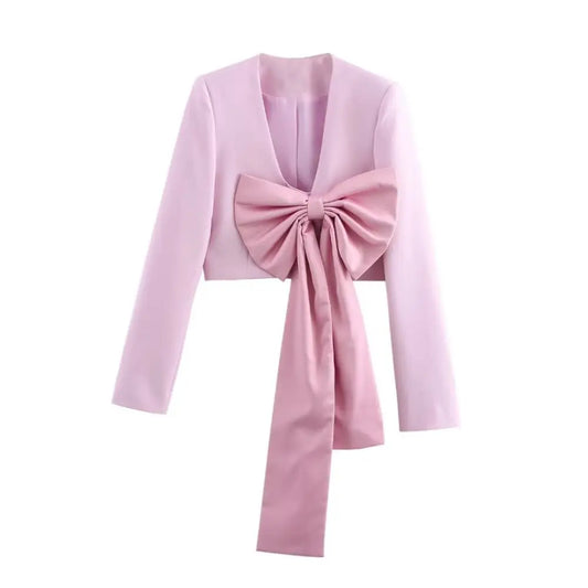 Lilac cropped blazer with a large pink bow.