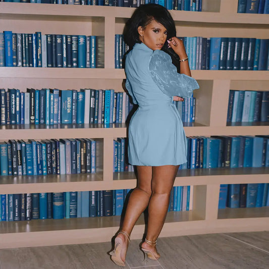 Woman in a light blue dress.