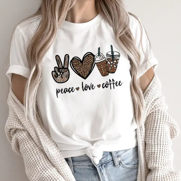 White t-shirt with peace, love, and coffee design.
