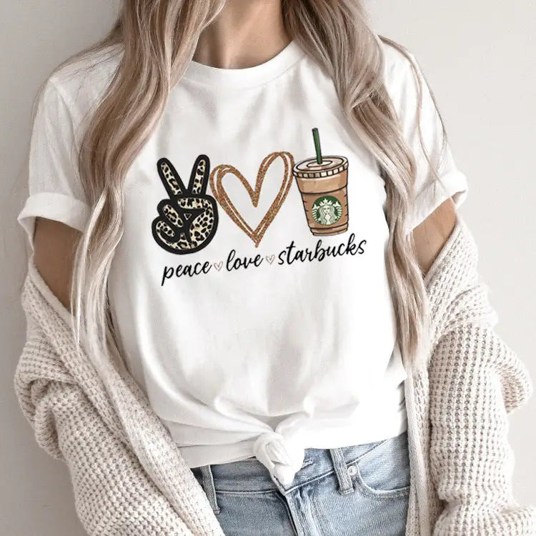 White t-shirt with ’peace love starbucks’ design.