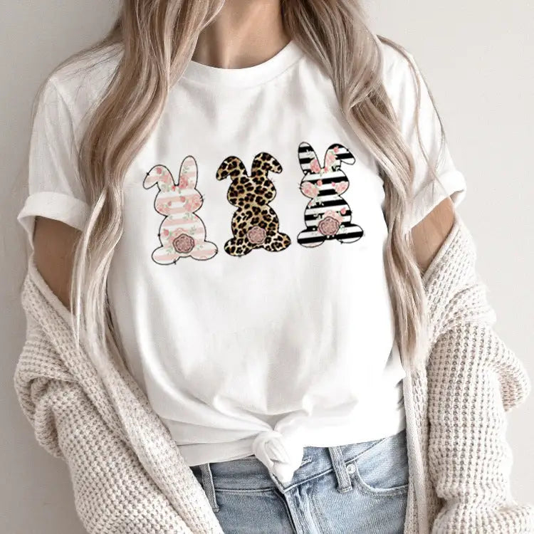 White t-shirt with bunny designs.