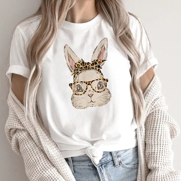White t-shirt with bunny graphic.
