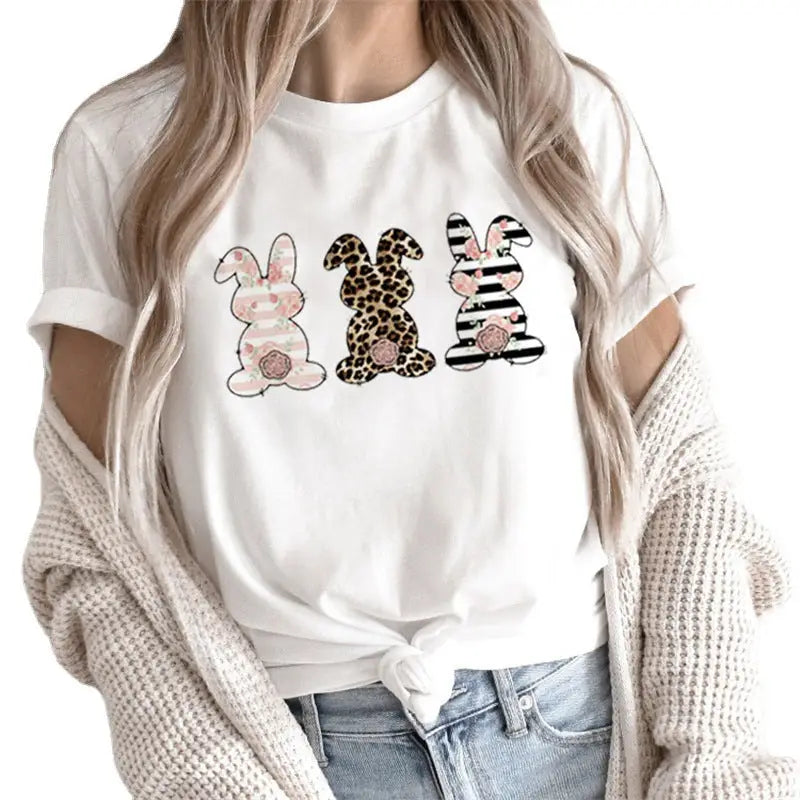 White t-shirt with bunny designs.