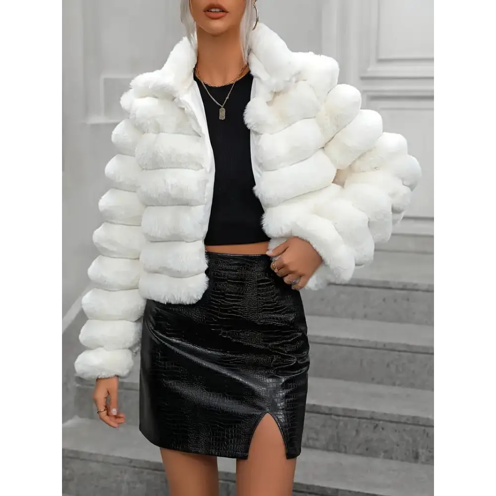 White faux fur jacket.