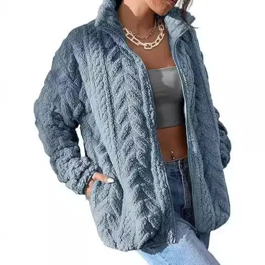 Blue textured zip-up jacket.