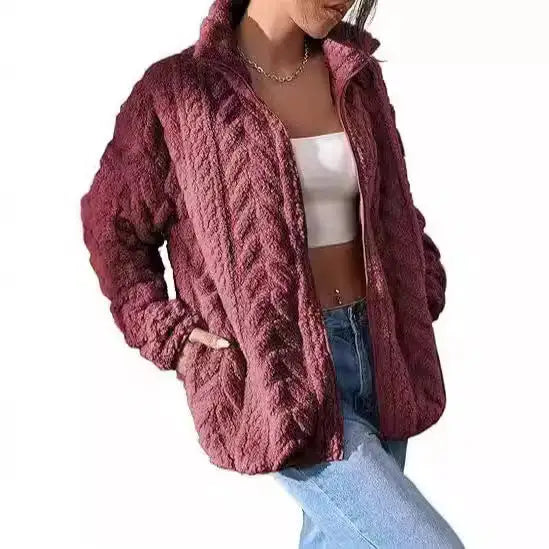 Burgundy cable-knit zip-up jacket.