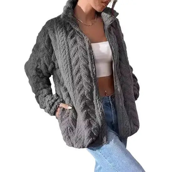 Gray cable-knit zip-up jacket.