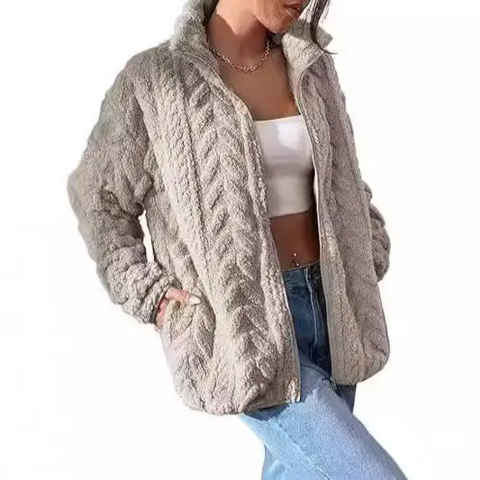 Gray cable-knit zip-up jacket.