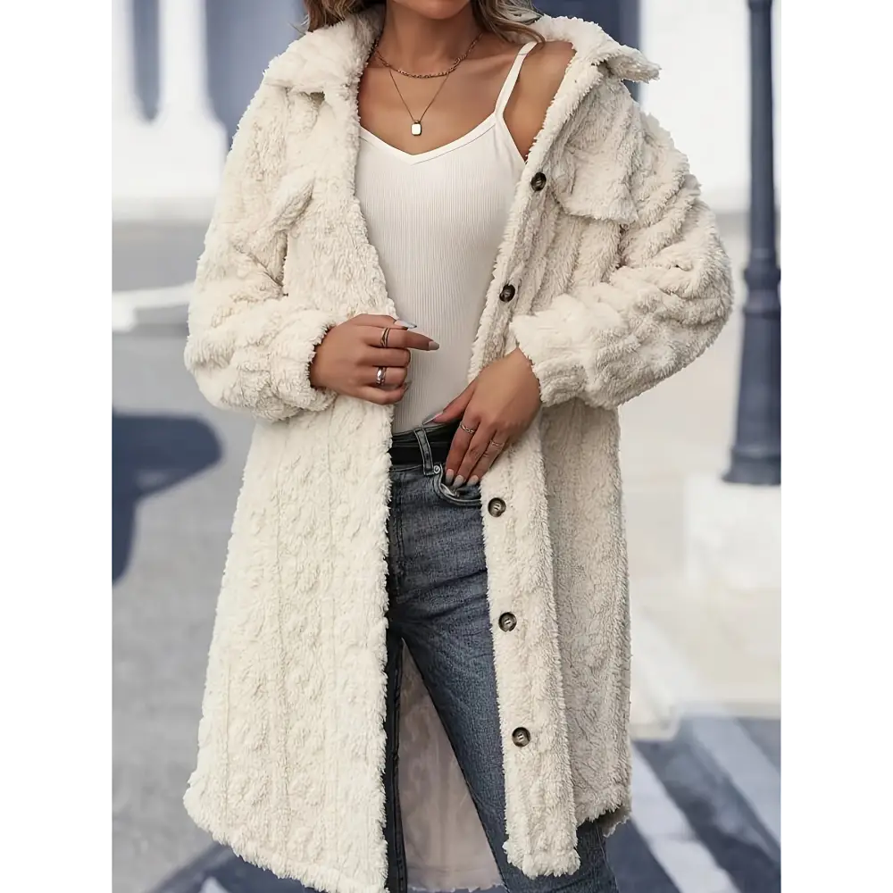 Cream-colored, button-down, faux fur coat.