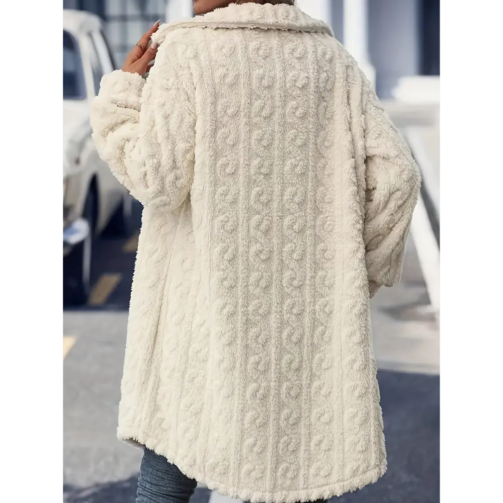 Cream-colored textured coat.