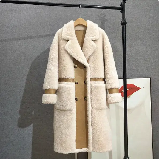 Cream-colored, double-breasted, faux fur coat.