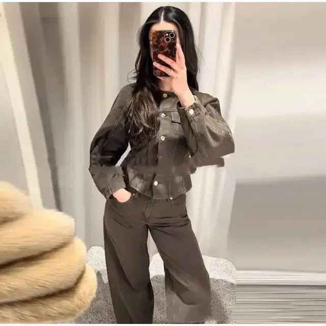 Woman in brown denim jacket and pants.