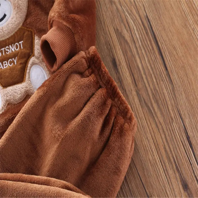Dreamy Snuggles: Cozy Pajamas & Playtime Suits