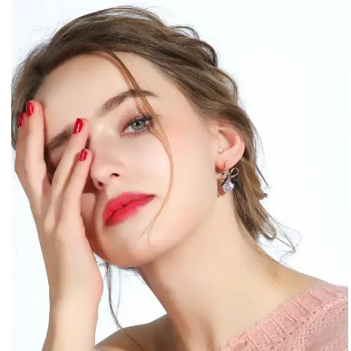 Elegance Bow: Graceful Short Earrings - Champagne Gold
