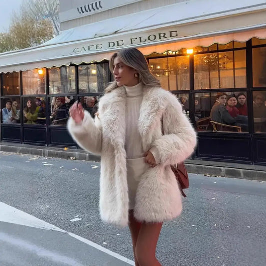 Woman in a fluffy white coat.