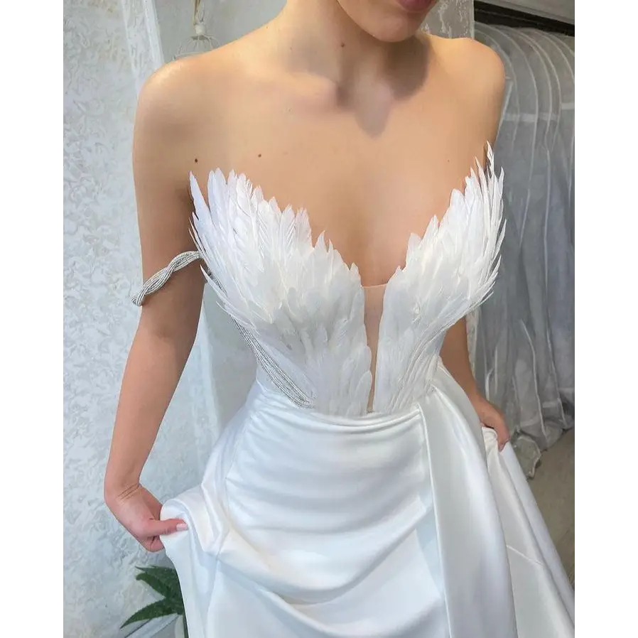 FeatherSweep Elegance Gown
