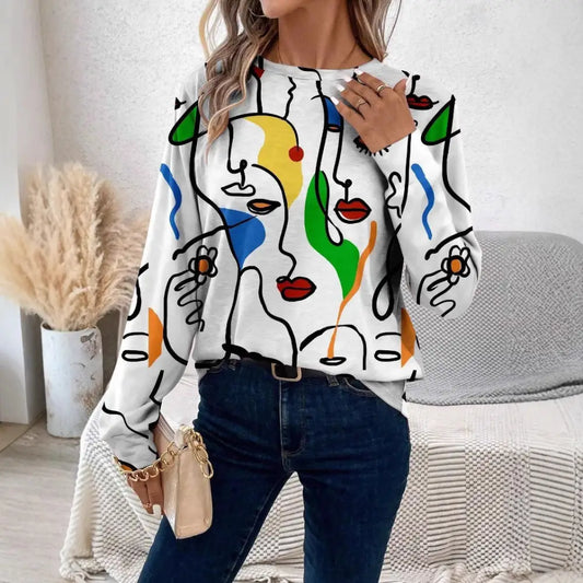 Woman’s long-sleeved abstract face print top.