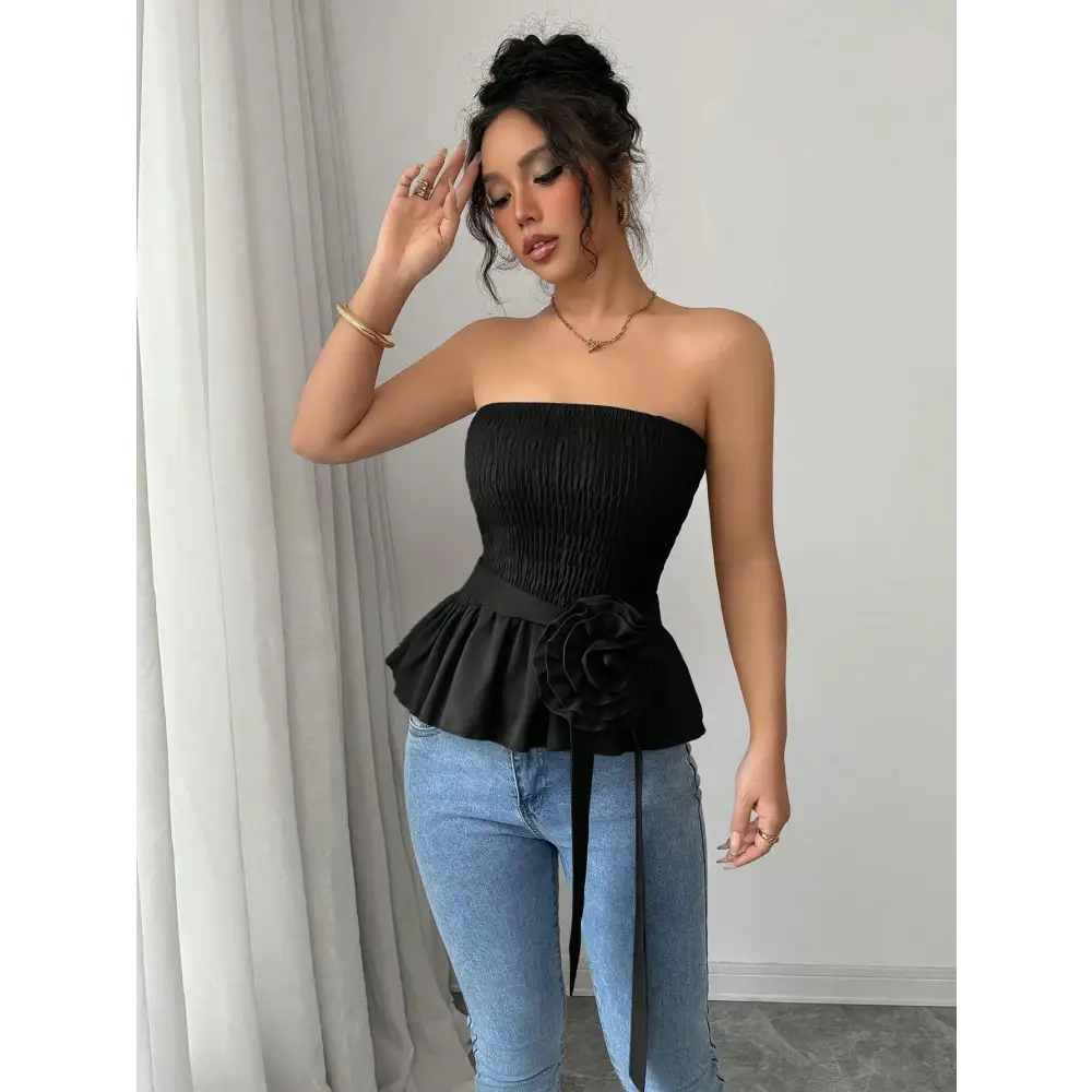 Black strapless peplum top.