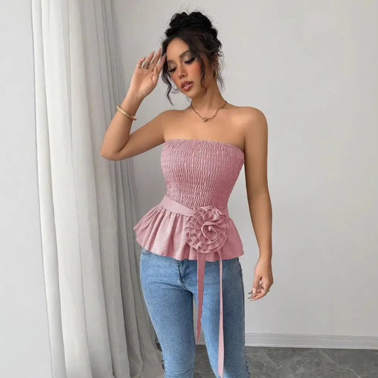 Pink strapless peplum top.