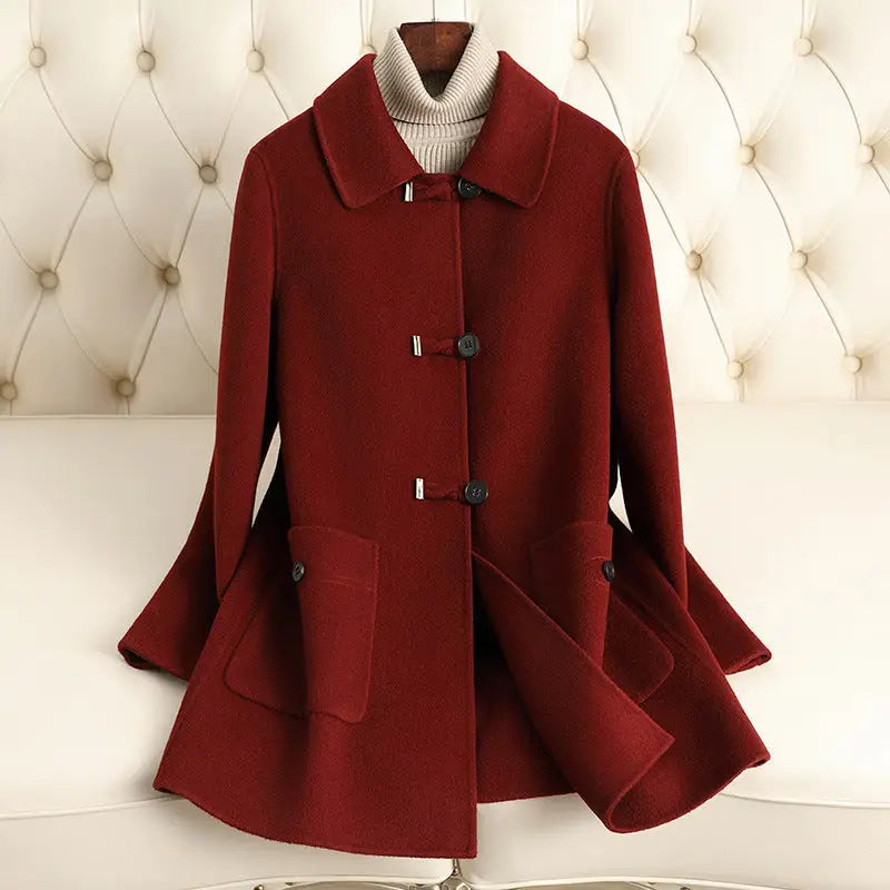 Burgundy wool coat with toggle closures.