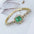 JewelSquare Luxe Watch with Diamond-Encrusted Stainless Steel Case - Square Style Golden Green