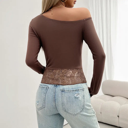 Brown long-sleeved top with lace trim.