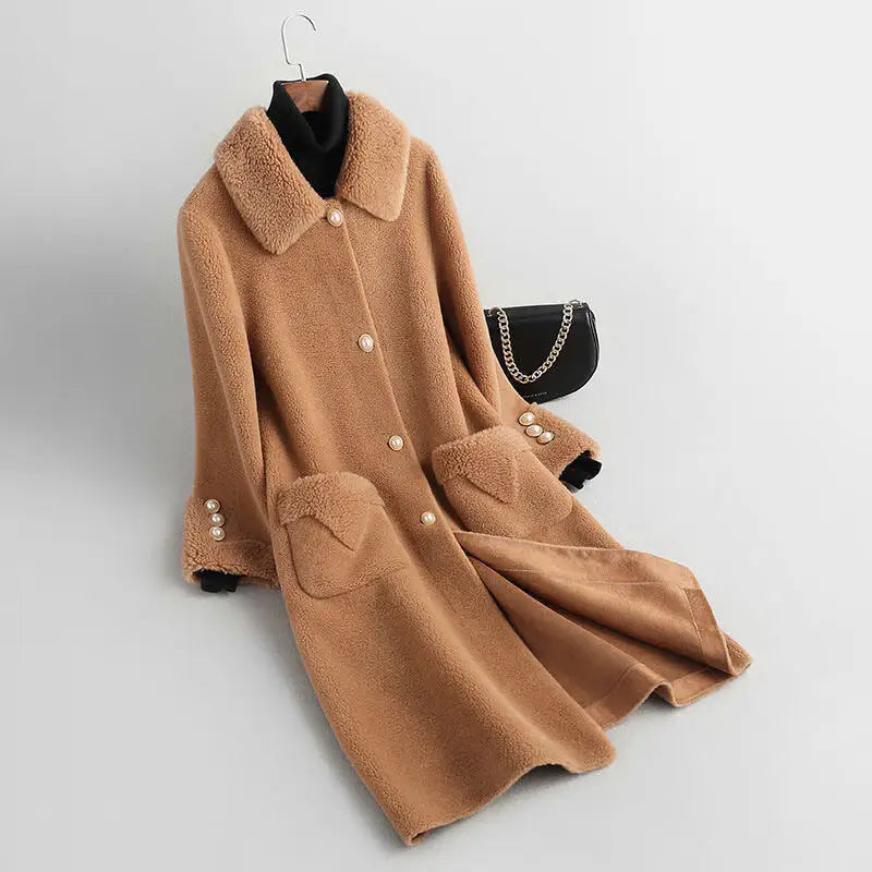 Tan faux fur coat with pearl buttons.