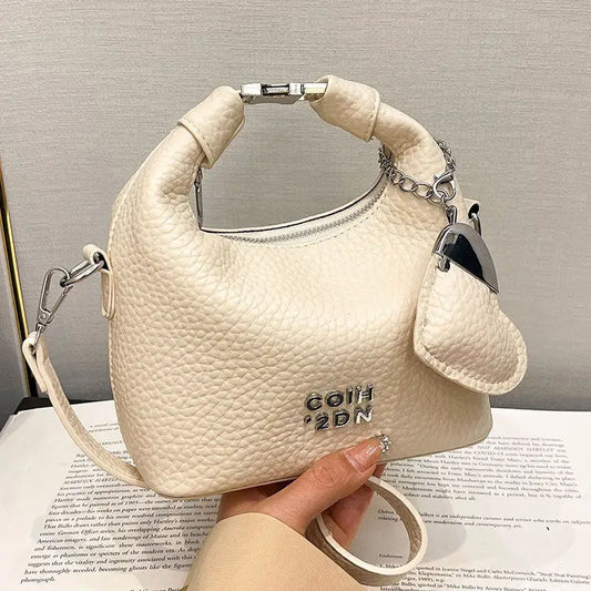 Litchi Luxe: Chic Commuter Messenger Bag