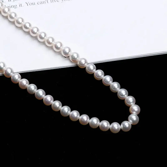 Strand of lustrous pearls.