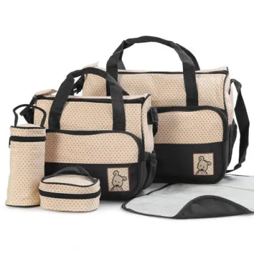 Beige and black diaper bag set.