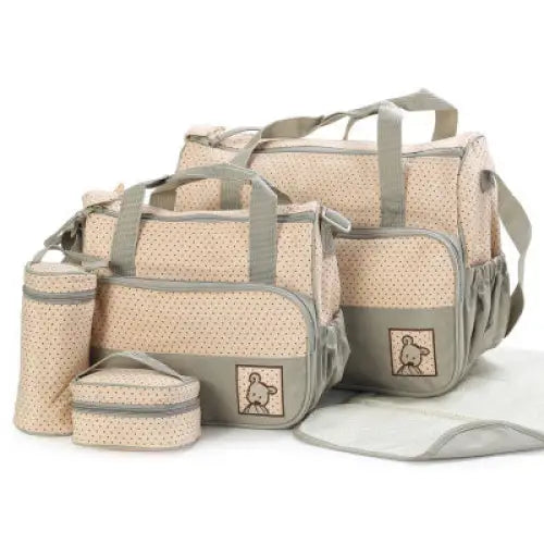Beige polka-dotted diaper bag set.