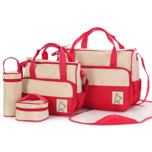 Red and beige polka-dot diaper bag set.