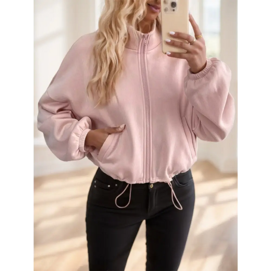 Pink zip-up bomber jacket.