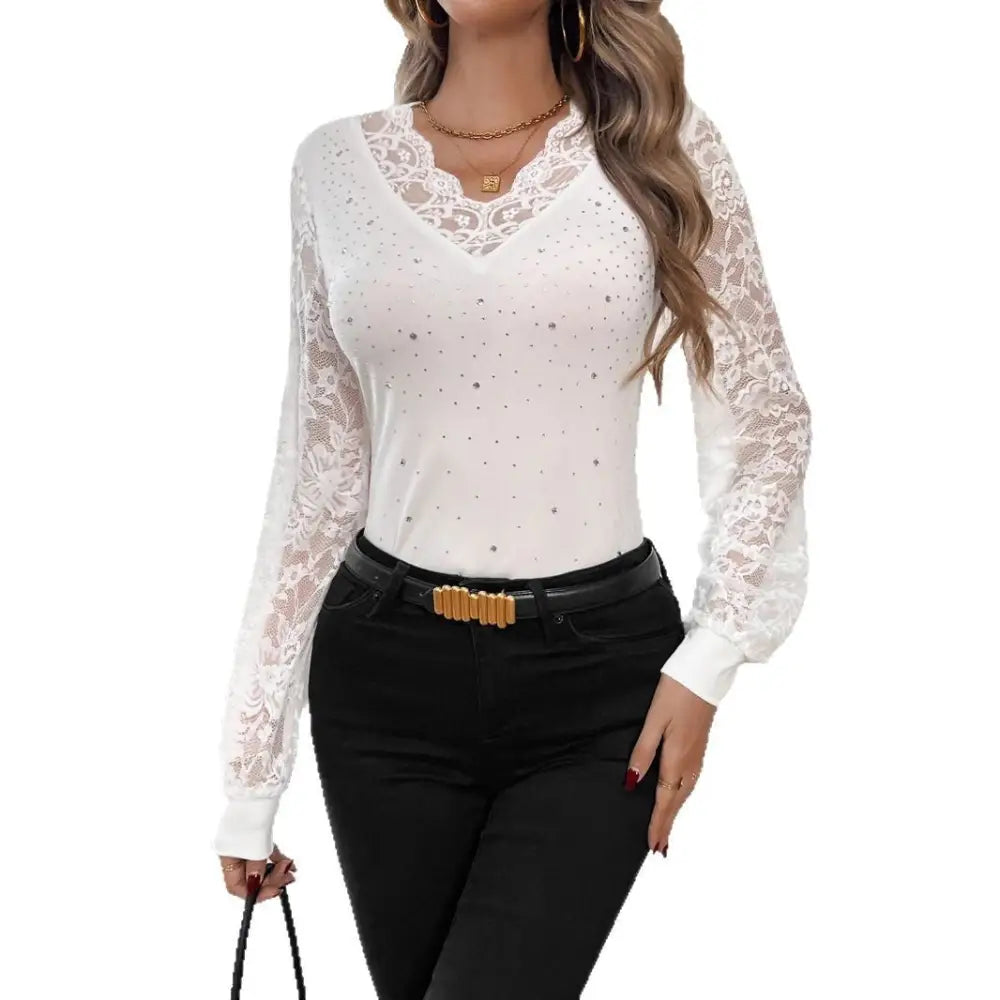 White lace-trimmed long-sleeve top.