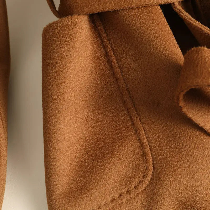 Brown suede-like coat detail.