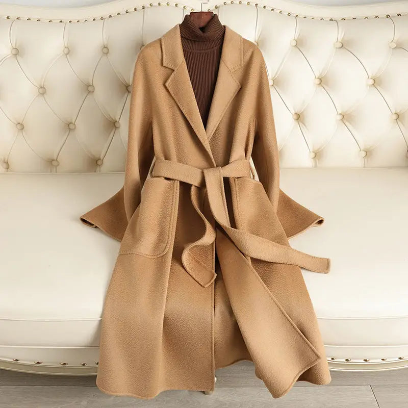 Tan wool coat with tie belt.