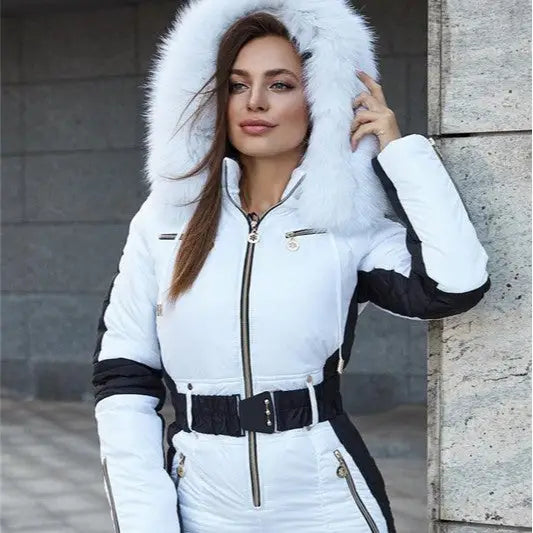 White and black ski suit with fur hood.