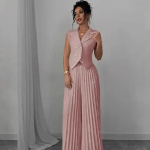 Pink pleated pantsuit.